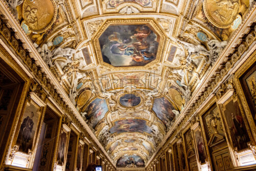 PARIS, FRANCE – OCTOBER 03, 2018: One of the intricately carved ceilings in the Louvre. Beautiful ornaments representing deities - Starpik