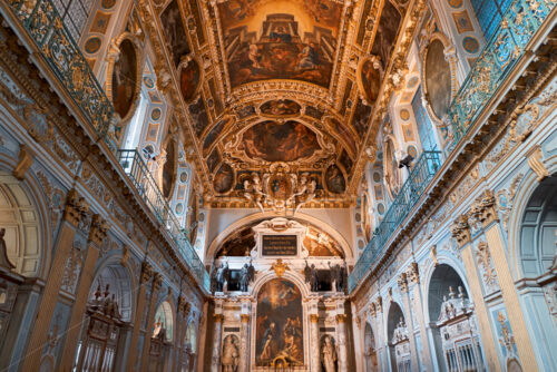 PARIS, FRANCE – SEPTEMBER 09, 2018: The Chapel of the Trinity in The Palace of Fontainebleau. Orange and teal colors. - Starpik