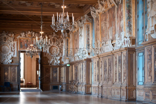 PARIS, FRANCE – SEPTEMBER 30, 2018: Gallery of Francis I in orange and teal colors. The Palace of Fontainebleau - Starpik