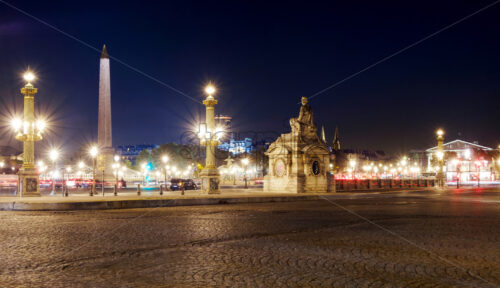 Place de la Concorde lit by lanterns at night, Paris, France - Starpik