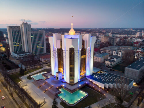 Presidency building with lights at night in chisinau with purple sky, Moldova - Starpik