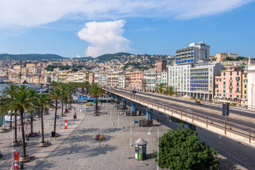 Promenade near Porto Antico with highway nearby. Wide shot. Genoa, Italy - Starpik