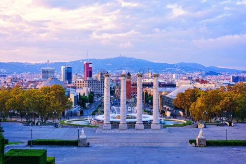 The Four Columns, in the front of Museu Nacional d’Art de Catalunya, Barcelona Spain at sunset - Starpik