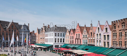 The Market Square buildings with people travelling in Antwerpen, Belgium - Starpik