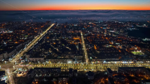 Video Aerial drone view of Dacia boulevard in Chisinau, Moldova at sunset time lapse - Starpik