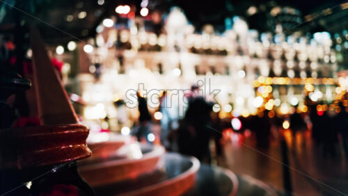 Video Blurred street view of the Monte Carlo Casino decorated for Christmas in the evening - Starpik Stock