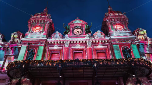 Video Monte Carlo, Monaco – December 14, 2024: Front view of the Monte Carlo Casino decorated for Christmas in the evening - Starpik Stock