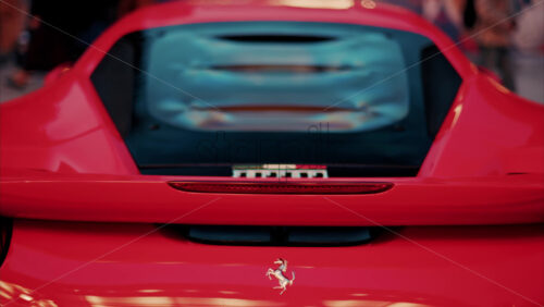 Video Monte Carlo, Monaco – October 24, 2024: Close up of a red Ferrari car in the courtyard of the Monte Carlo Casino in the evening - Starpik Stock