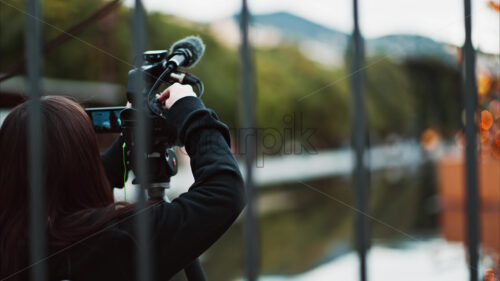 Video Two girls filming people walking through Place Massena in daylight - Starpik