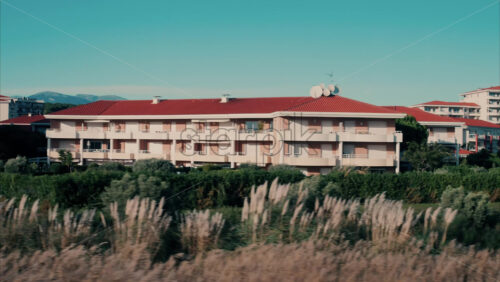 Video View from a moving train of the houses in Antibes, France - Starpik Stock