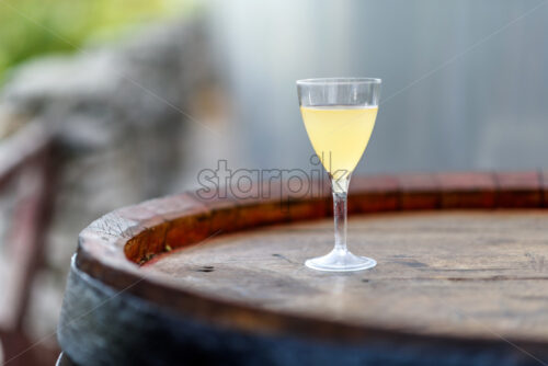 fresh wine juicy on a barrel table, wine festival - Starpik