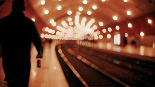 video Blurry view of people and trains moving through the Monaco train station with bright lights in Monte Carlo, Monaco - Starpik Stock