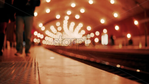 video Blurry view of people and trains moving through the Monaco train station with bright lights in Monte Carlo, Monaco - Starpik Stock