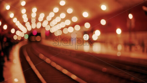 video Blurry view of people and trains moving through the Monaco train station with bright lights in Monte Carlo, Monaco - Starpik Stock