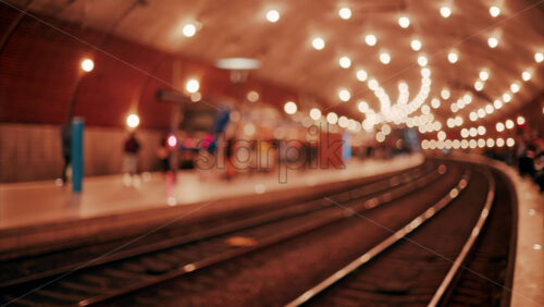 video Blurry view of people and trains moving through the Monaco train station with bright lights in Monte Carlo, Monaco - Starpik Stock