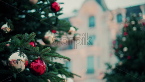 video Close up of decorations on a Christmas tree in front of the Monte Carlo Casino in Monaco - Starpik Stock