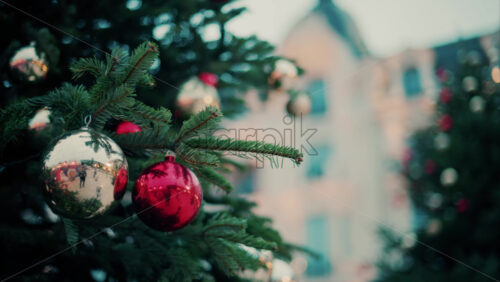 video Close up of decorations on a Christmas tree in front of the Monte Carlo Casino in Monaco - Starpik Stock