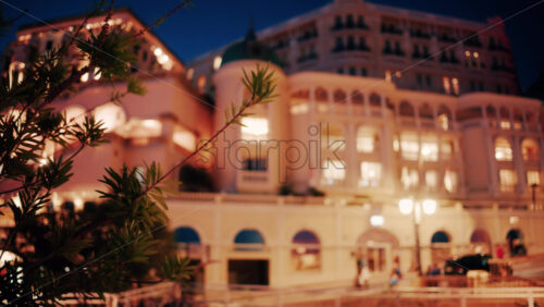 video Monte Carlo, Monaco – October 14, 2024: The facade of Hotel de Paris in the evening - Starpik Stock