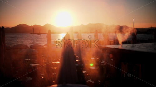 video View of a beach in the French Riviera at sunset - Starpik Stock